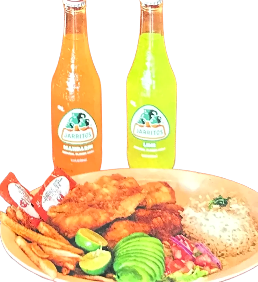 Breaded fish fillet with rice, avocado, lime and fries, two sodas behind